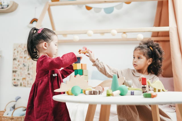 two kids playing in daycare